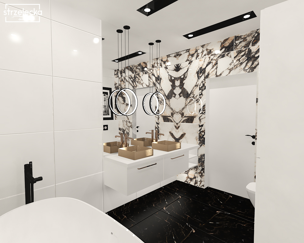 Nowoczesna łazienka w bieli i czerni ze złotą umywalką