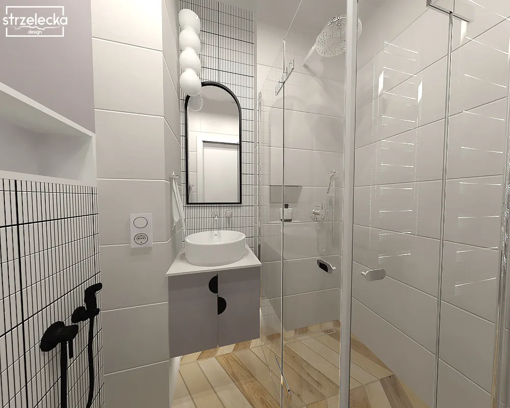 Biała łazienka z czarnymi dodatkami