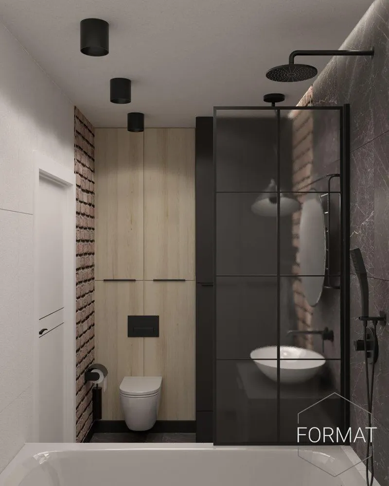 Aranżacja łazienki z cegłą, szkłem i metalem w roli głównej