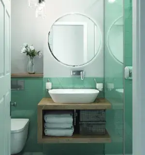 Biel i zieleń do małej łazienki